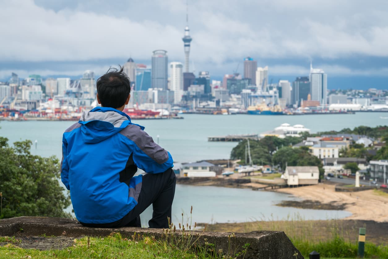 Man from New Zealand looking out over Auckland